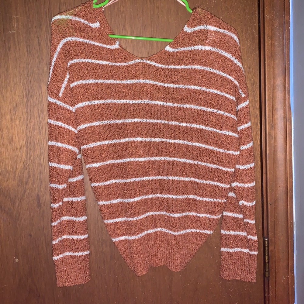 Orange and white striped sweater with knot back